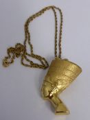 An 18 ct Gold Pendant and Chain depicting Nefertiti approximately 9.4 gms suspended from a very