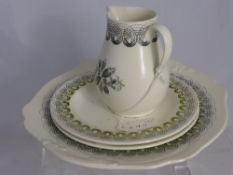 A part Wedgwood Persephone tea service, designed by  Ravilious, comprising milk jug, sandwich plate