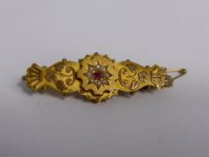 Lady`s Victorian 9ct Mourning Brooch set with seed pearls and a single ruby with crown and floral