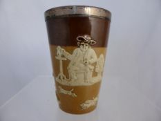 A small Doulton Lambeth Ware Harvest beaker decorated with rustic characters and a hunting scene,