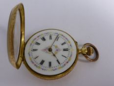 Lady`s 18ct (18k) Open Face Pocket Watch, finely engraved case of foliate design, white enamel hand