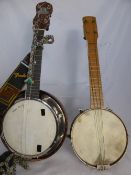 Two George Formby Ukulele Banjos, one with case.