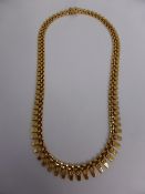 An 18 ct Gold Hollow Graduated Fringe Necklet with Box Catch stamped 750 approximately 43.5 cms in