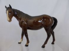 A Beswick Porcelain Study of a Mare 23 cms long x 16 cms high.