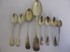 A collection of misc. solid silver spoons incl. a London 1825 table spoon, three Georgian London