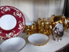 Six pieces of Royal Worcester porcelain comprising two gold lustre ware teapots, gold lustre ware