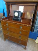 An Edwardian Vanity mahogany chest of drawers on ball and claw feet with four graduated drawers and