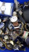 A box of assorted lady`s and gent`s watches incl. A Timex Quartz Digital Watch.