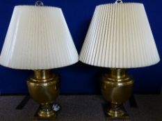 Pair of Brass Decorative Lamp Bases, together with cream shades.