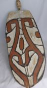 An Ancestral Cope Board - Sepik River - Papua New Guinea - having ochre geometric design, approx. 92