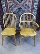 A Bespoke Set of Four Oak Country Spindle Back Dining Chairs, together with two Carvers of similar