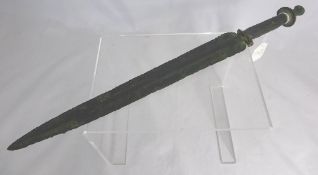 A Bronze Age short sword, circa 750 B C, approx. total length 44 cms.