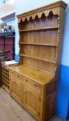 A Bespoke Oak Cottage Dresser, the dresser features a double cupboard base with two drawers above