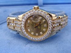 A lady`s 18 ct yellow gold and diamond set Rolex Pearlmaster perpetual date just wristwatch. The