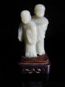 Chinese Qing Dynasty White Jade Figure of Sages, good colour. 14 cms (5 1/2"") to include stand, 9