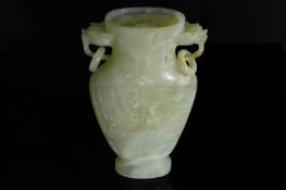 Chinese Qing Dynasty Pale Celadon Jade Vase, features white inclusions. The vase having Taotie