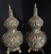 Pair of Chinese Antique Double Gourd Repoussé Lidded Urns, the urns having overall ornate vine leaf