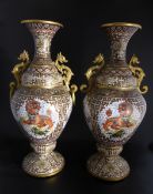 Pair of Outstanding 20th Century Cloisonné Vases, the vases depicting Imperial Guardian Lions, the