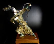 Chinese Qing Dynasty Silver and Enamel Figure of a Female Archer, The figure wearing finely worked