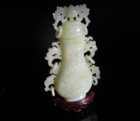 Chinese Qing Dynasty Milky Jade Vase and Cover, the vase of baluster form featuring a double ring