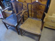 Two pairs of Chippendale style mahogany elbow chairs having cane seats (4)