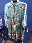 A vintage Chinese Silk Mandarin Style Coat, the highly embroidered coat decorated with