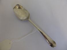 A solid silver table spoon, London circa 1754.