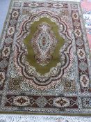 Indian Style Carpet, the carpet of olive and ruby design. 205 x140cms.