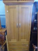 A Single Oak Wardrobe having one drawer below, approx. 93 x 60 x 190 cms.