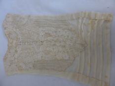 A 17th Century Needle Lace Bib Front with exquisite floral detail together with a later silk scarf