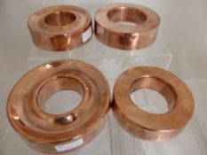 Four Copper Moulds, measuring 17, 15.5, 15 and 14 cms