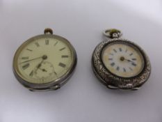 Two Lady`s silver Pocket Watches, the watches both feature enamel faces and Roman numeral dials. (