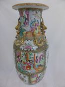 A Cantonese Famille Verte Vase, the vase with gilded Foo dog handles and gilded salamander to