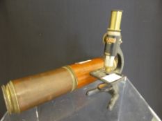 A vintage wood and brass telescope ( lenses are loose inside ) together with a small Milbrow