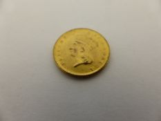 An 1862 pure gold United States $1 coin, approx. 1.6 gms.