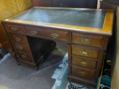 A Victorian mahogany twin pedestal desk being leather topped with three drawers to each pedestal
