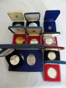A collection of misc. GB silver and other coins incl. two Silver Jubilee oval ingots, Silver