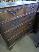 Victorian oak chest of drawers, two short and three long drawers beneath on bracket feet.