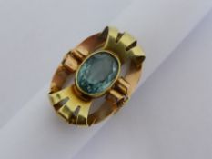 A lady`s 14 ct. 585 hallmark yellow gold dress ring set with an oval turquoise stone, possibly