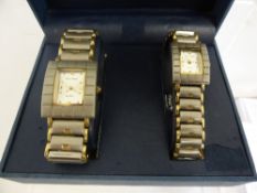 Pierre Goldani Quartz Wrist Watches, the his and hers square faced watches with gilt highlights.