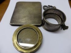 A collection of misc. silver incl. two napkin rings, vesta case, carved case, two photograph frames