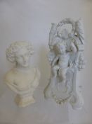 A Victorian parian style flower vase depicting a cherub together with a Victorian parian style bust