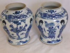 A pair of 19th Century Chinese Export Blue and White Ginger Jars, the ginger jars depicting a lady