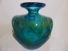 A turquoise blue Medina style glass vase, approx. 17 cms. together with a smaller vase with