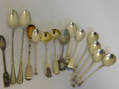 A collection of misc. silver spoons incl. two long handled continental spoons with engraving to the