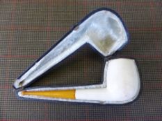 A Gentleman`s Lot, A Bernstein Amber and Bakelite pipe in original leather box.