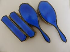 Lady`s Blue Enamel Dressing Table Brush Set, comprising a pair of hair brushes and a pair of