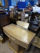 A Limed Oak Art Deco Dressing Table with a single drawer and cupboard beneath, 93 x 145 x 50 cms