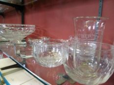 A quantity of assorted cut glass including a large trifle bowl, ten dessert bowls, trinket dishes,