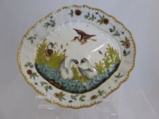 Oval Dish from the Naples factory, Majolica decorated in polychrome with swan & heron in waterside